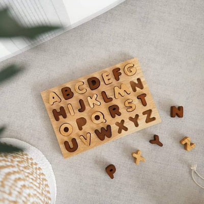 Natural capital letter puzzle Plum Thanatos